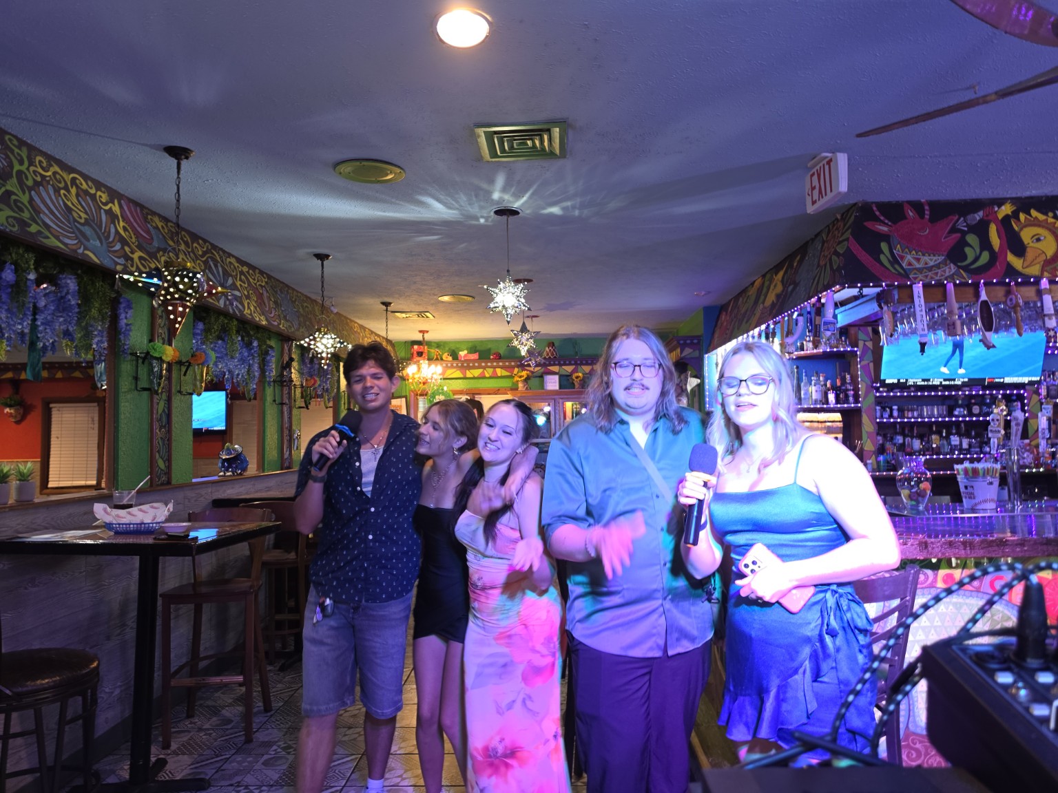 A group enjoying karaoke at Los Cabos