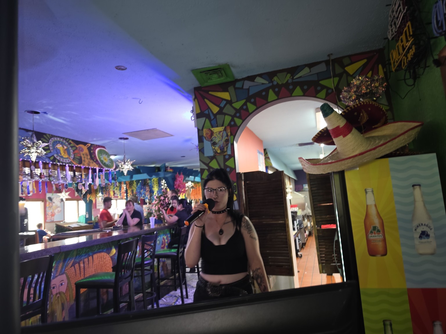 Singer performing karaoke at Los Cabos