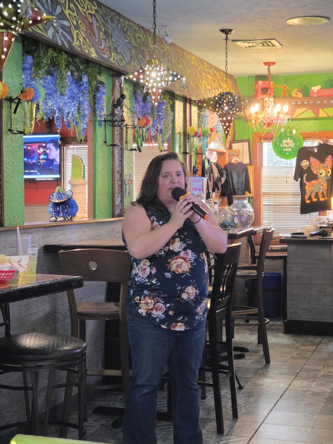 Singer performing karaoke at Los Cabos