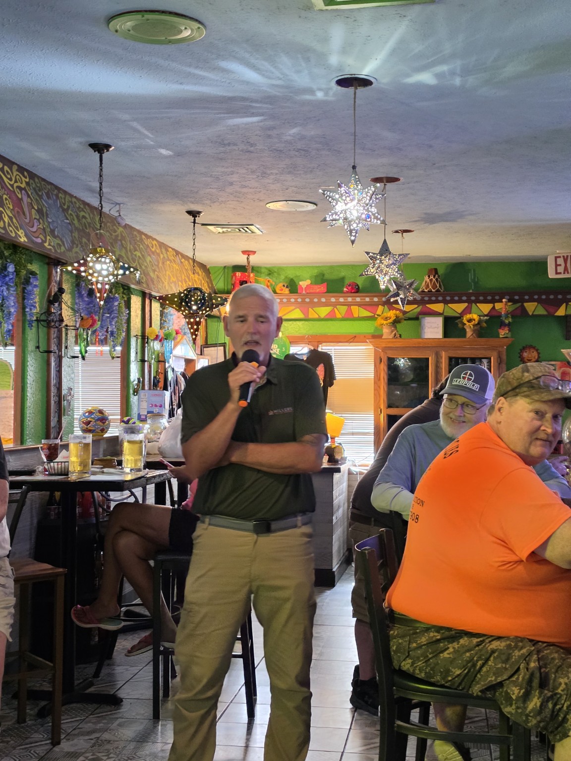 Karaoke singer performing at Los Cabos